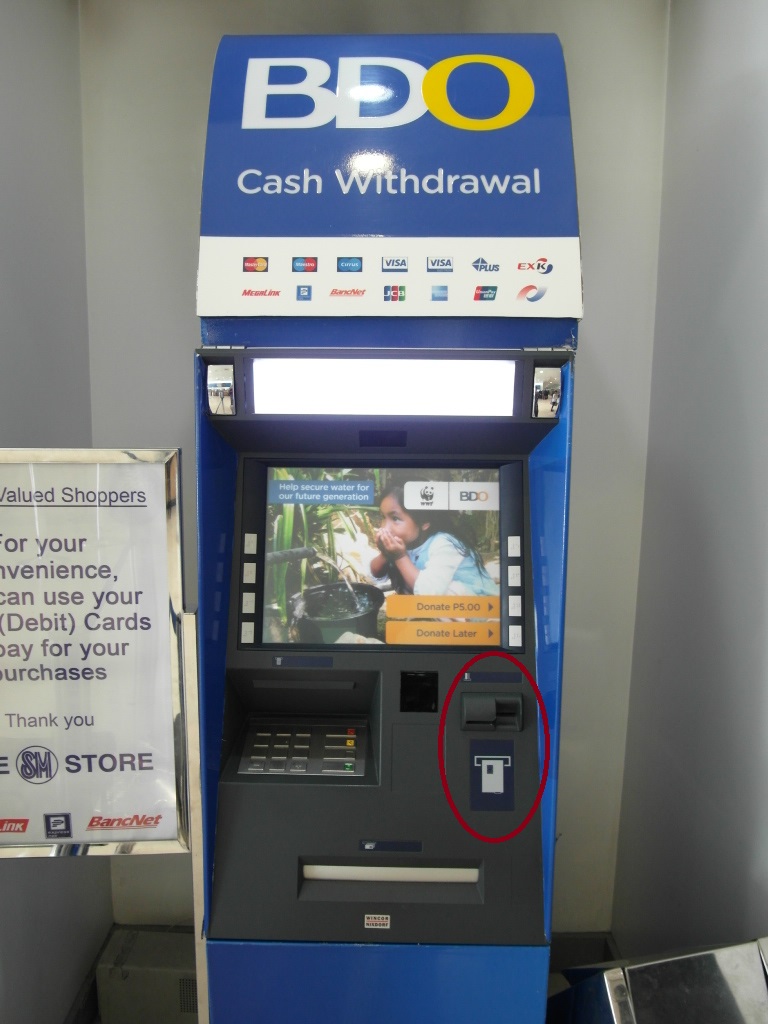 ATM カード挿入